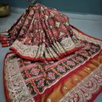 Silver Haram Designs and Patan Patola Saree for a Regal Traditional Look
