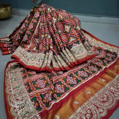 Silver Haram Designs and Patan Patola Saree for a Regal Traditional Look
